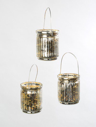 This hanging tea light in silver mercury glass shimmers elegantly when lit.