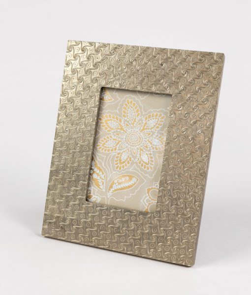 Embossed metal photo frame is smart, elegant, and is an ideal home gift