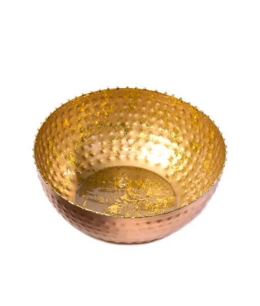 This gold enamel bowl with a beaded edge is the essence of fine dinning.