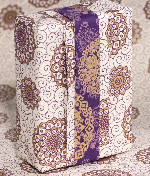 Wrapping paper Purple Rangoli print isrich, luxurious and eco friendly too.
